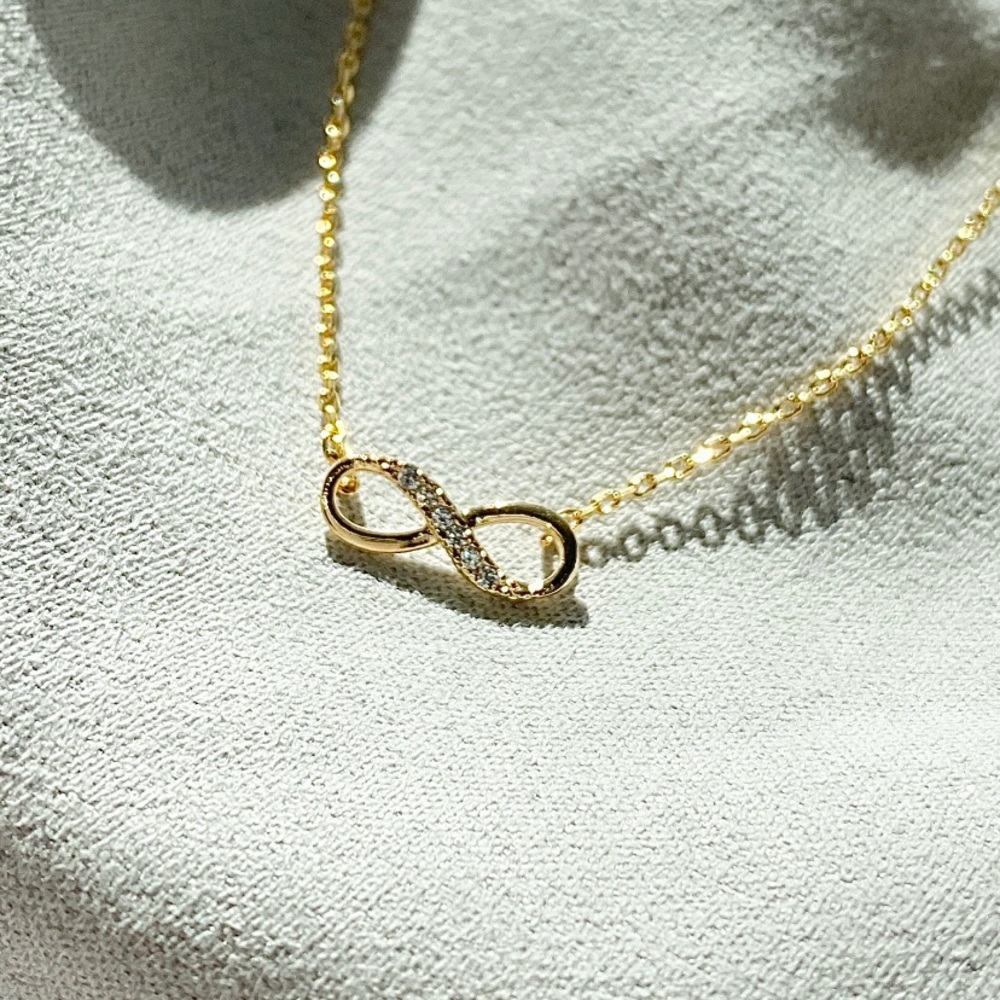 Infinity Crystal Gold Toned Necklace